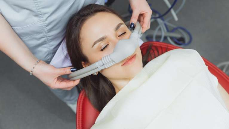 a female patient getting sedation dentistry in Monroe, WA,