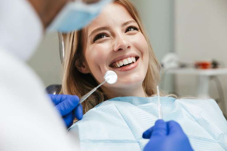a woman getting a Dental Implant Procedure in Monroe, WA