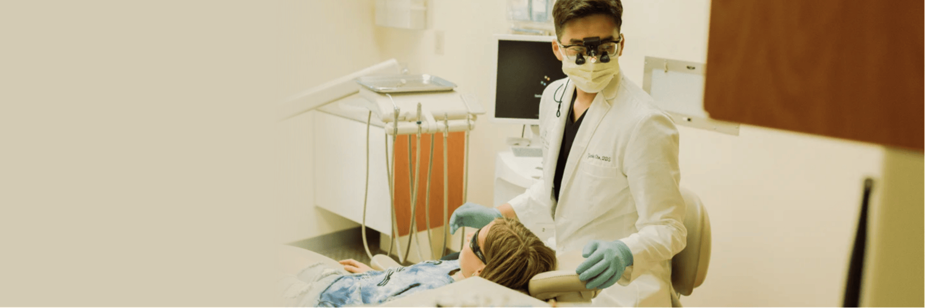 Woman sitting in dental chair smiling