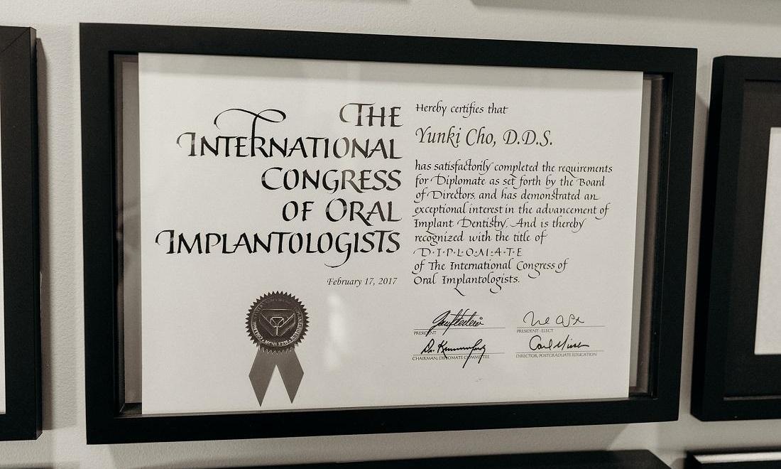 Certificate to show Dr. Cho is an implant specialist 